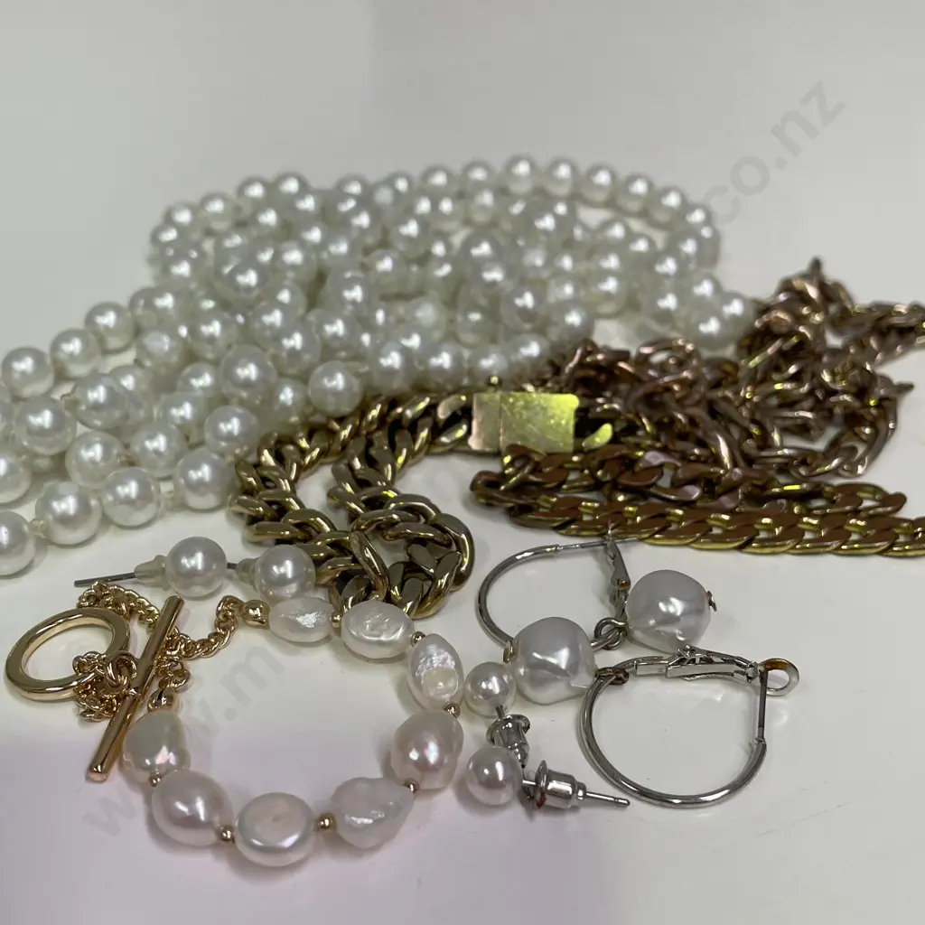 Two Gold Coloured Chains with assorted pearl jewellery Image 1++