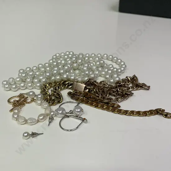 Two Gold Coloured Chains with assorted pearl jewellery