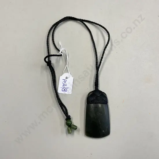 Greenstone Pounamu with rope necklace and greenstone tie ends.