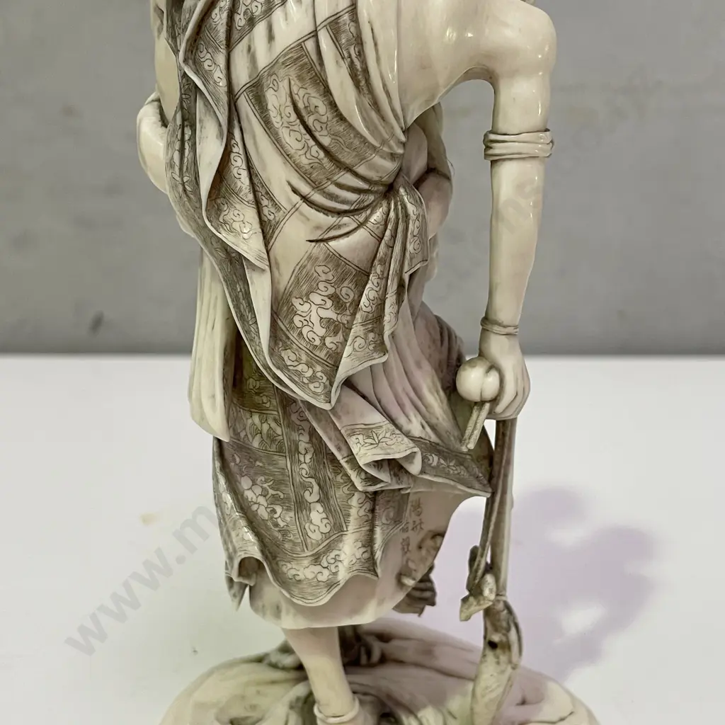 Intricately Carved Fine Ivory Okimono. Rakkan attempting to pull a Kappa from the Sea. H18cm. Base claw is detached. Image 1++