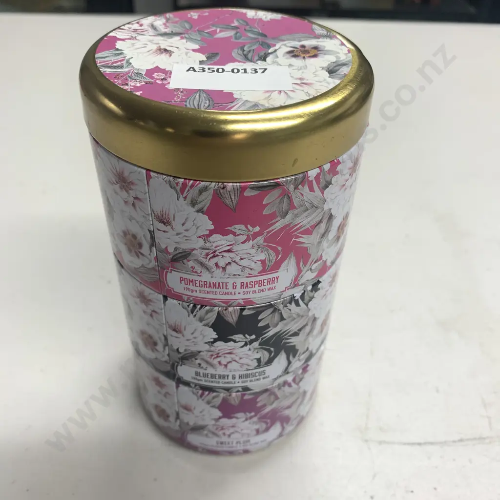 As New Set of 3 Candles in Stacked Tins with Floral Decorations Image 1++