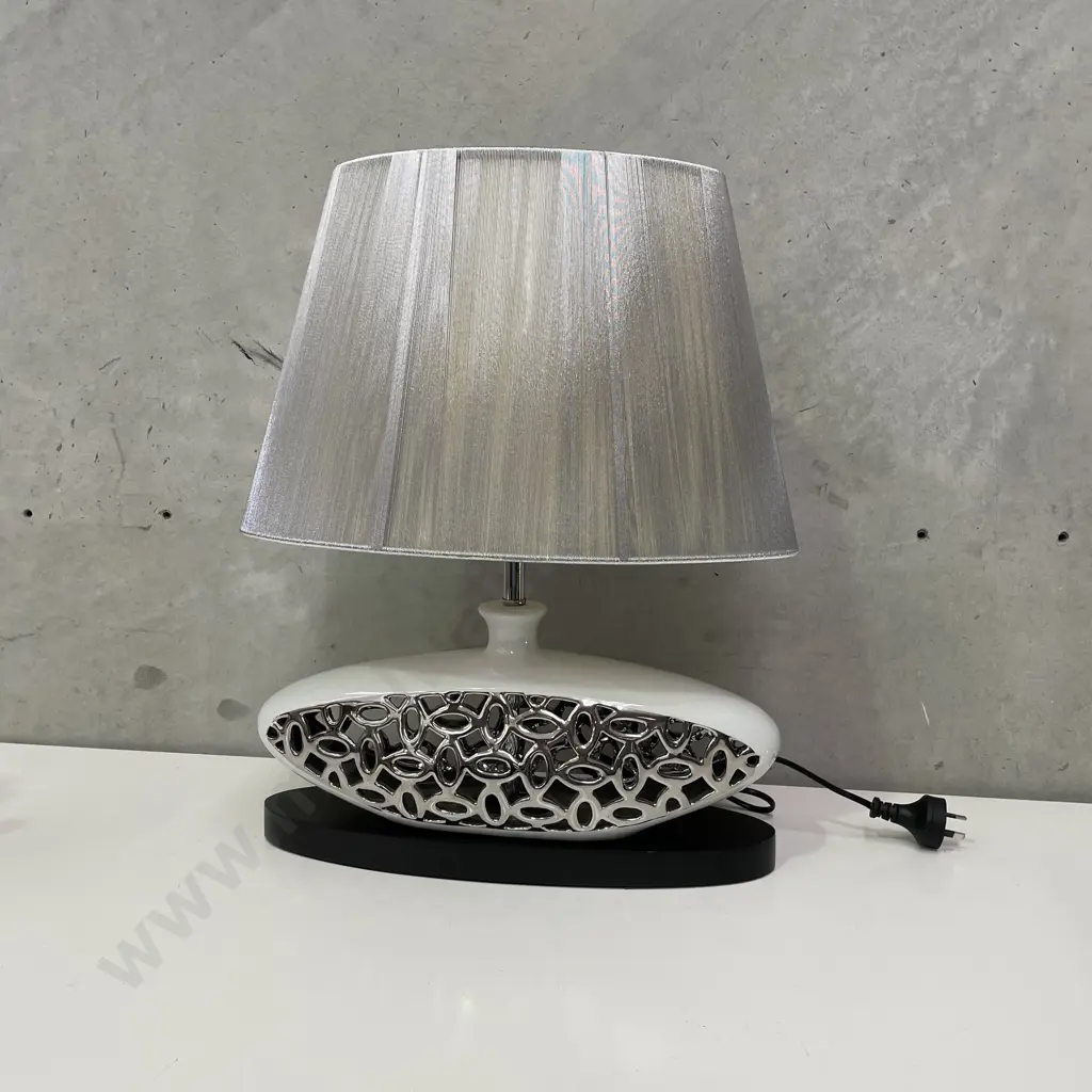 Stunning Modernist Table Lamp. Ceramic and Silver squat shape on black wooden plinth. Silver shade. H51 W40cm. Working. Image 1++