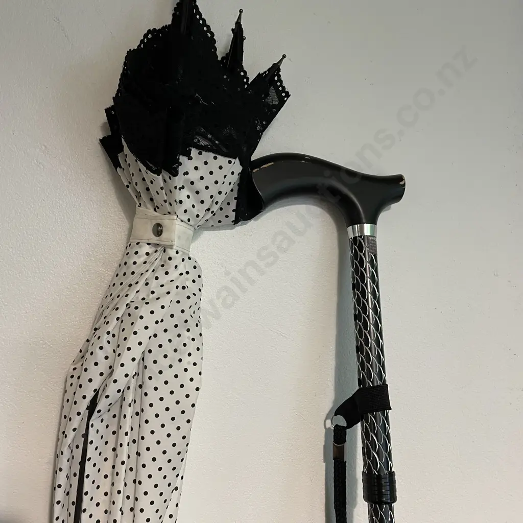 4 Piece black and silver walking stick with retro black and white umbrella Image 1++