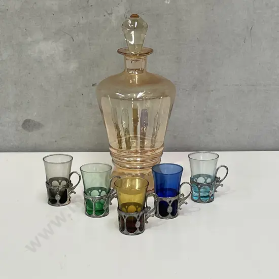 Vintage Retro Irresdescent Glass Decanter with 5 multicoloured glass cups with metal frame and handle