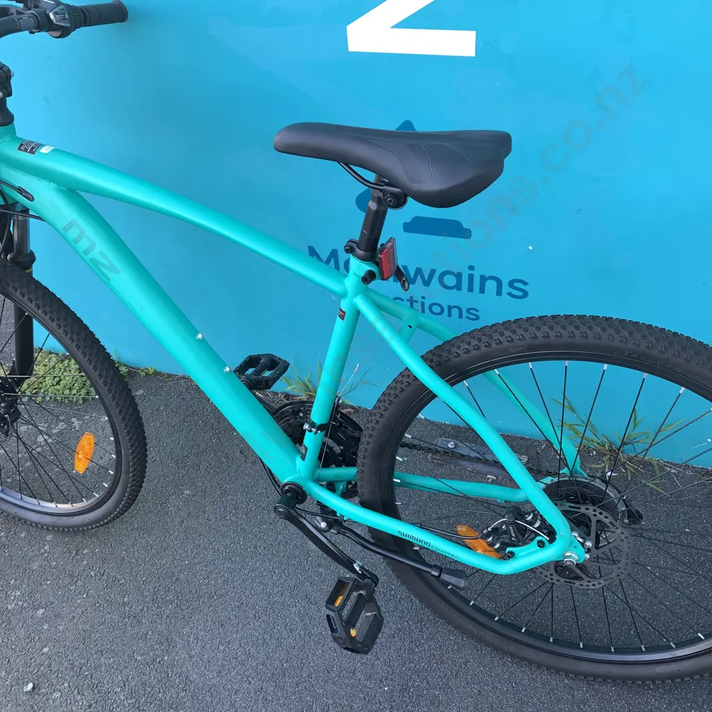 Green MZ Mountain Bike with Helmet Image 1++
