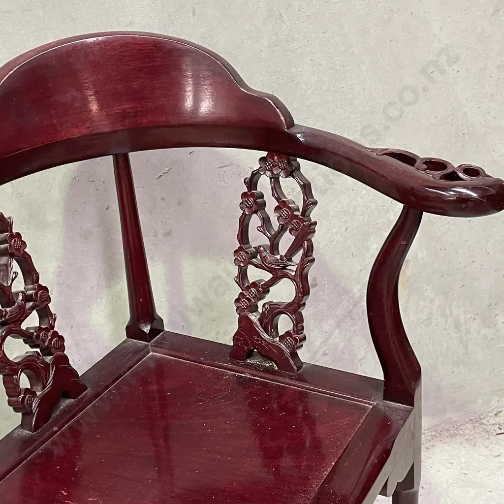 Pair of Vintage Chinese Rosewood Armchairs. Cross base with oval high back plate and intricately carved panels and arms. Image 1++