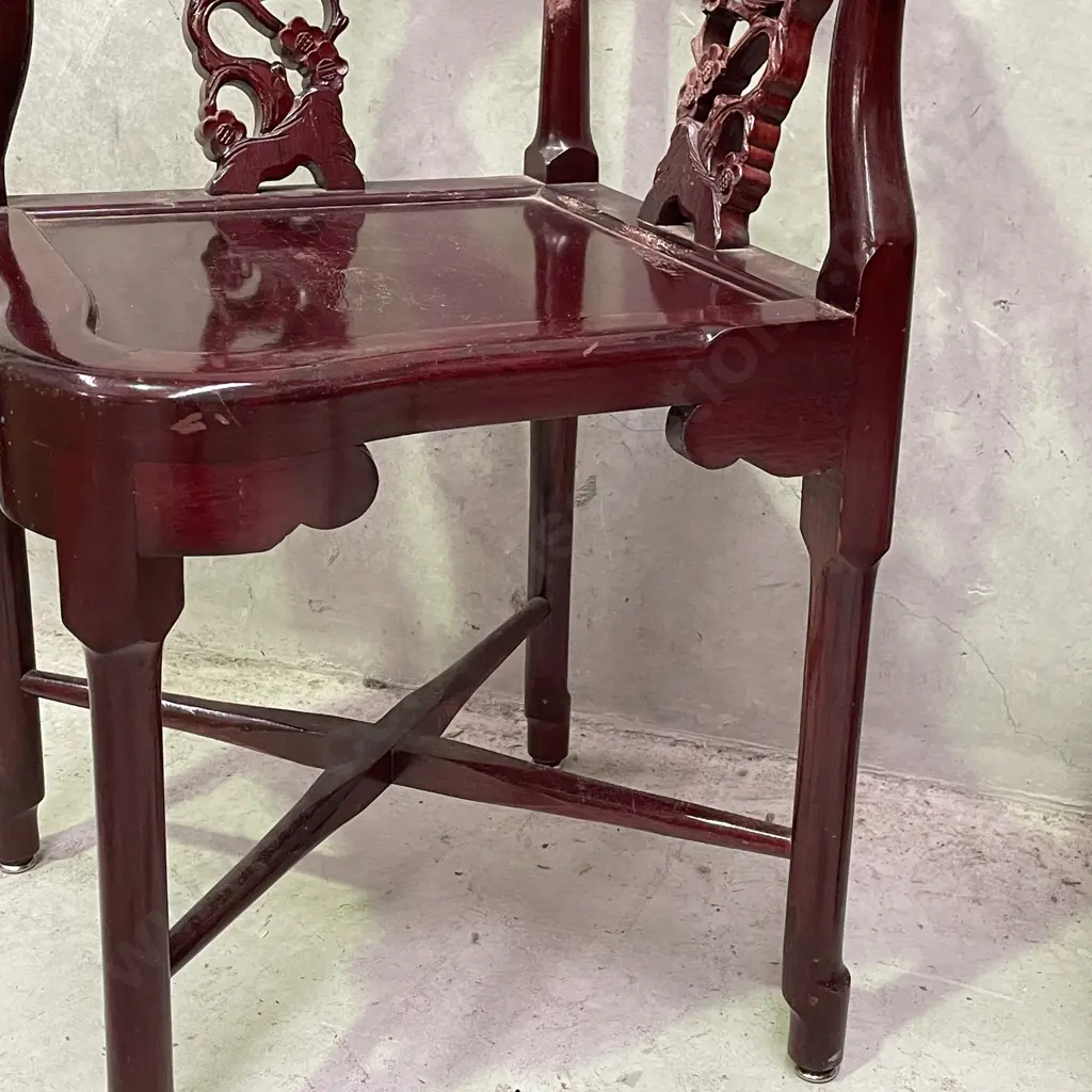 Pair of Vintage Chinese Rosewood Armchairs. Cross base with oval high back plate and intricately carved panels and arms. Image 1++
