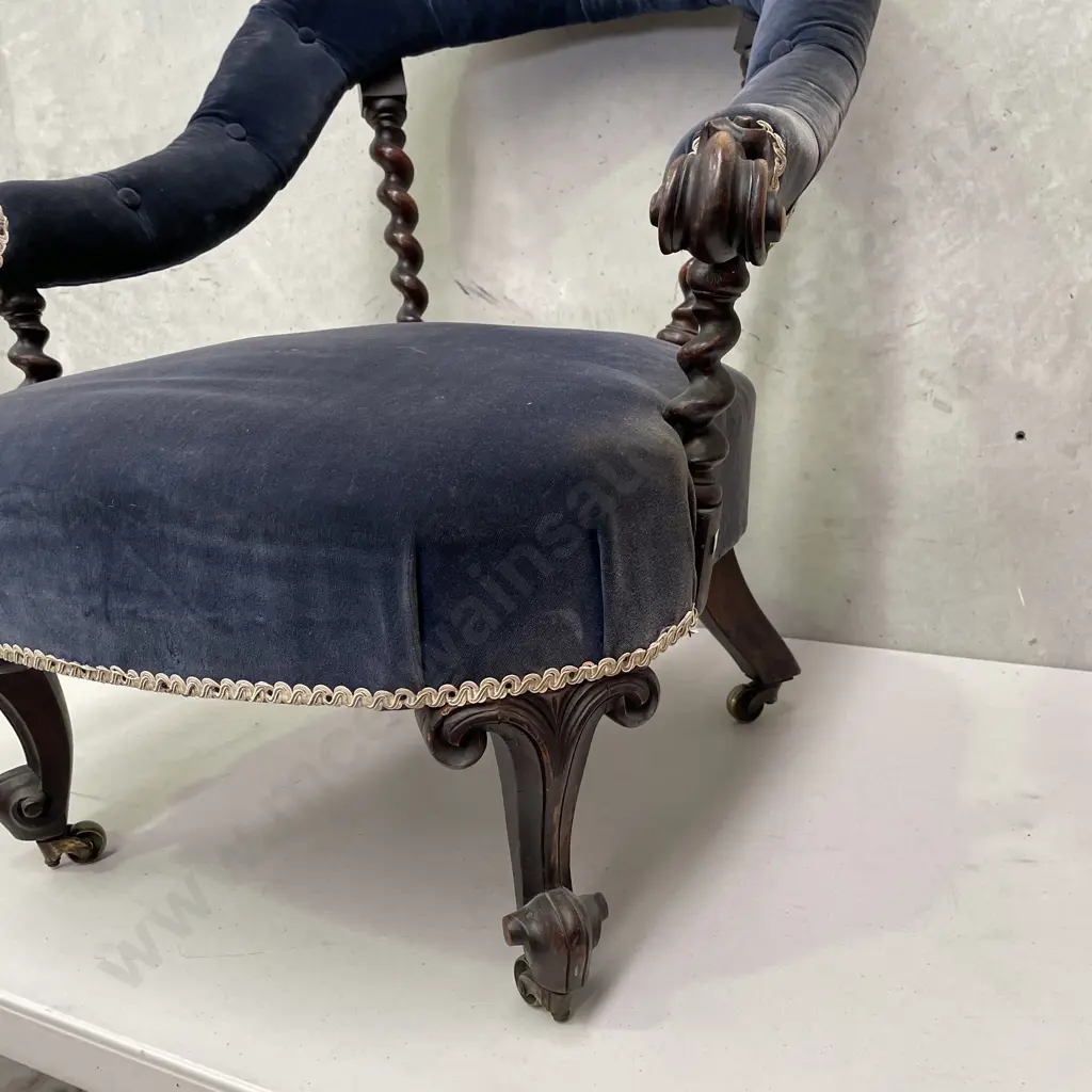 Antique Tub Chair. Carved barley twist pillar back, buttoned royal blue velvet fabric. Original castors Image 1++