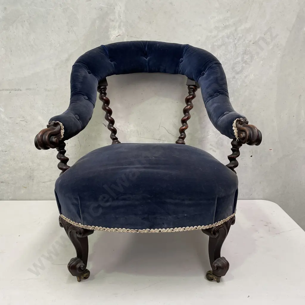 Antique Tub Chair. Carved barley twist pillar back, buttoned royal blue velvet fabric. Original castors Image 1++