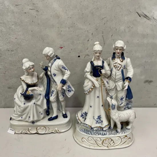 Pair of Large Continental Victorian Style Blue, white and gilded figurines. H32 and H29cm