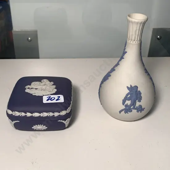 Wedgwood x 2 items. Cobalt blue Jasper ware lidded trinket box 8 x 8cm H4.5 and White and Blue relief Vase H14cm