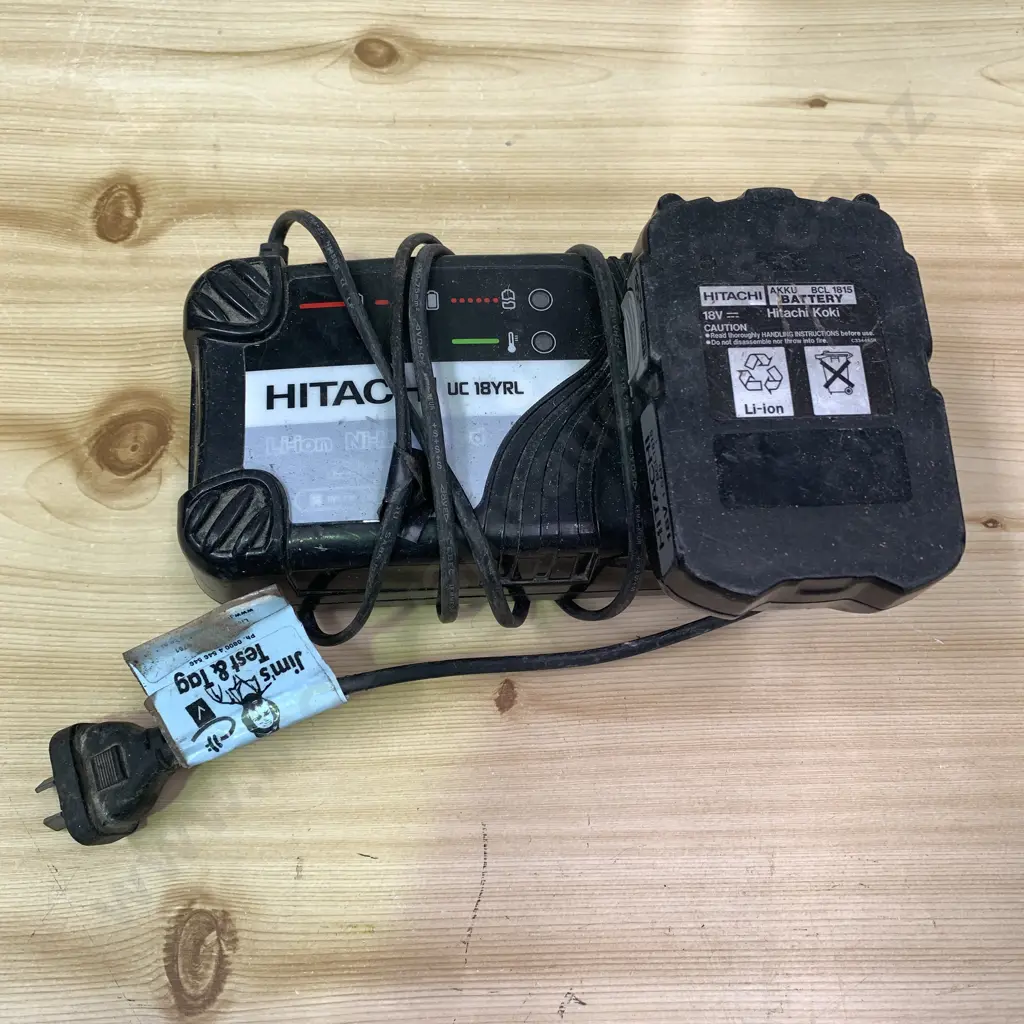 HItachi Li-Ion Battery Charger and Battery Image 1++