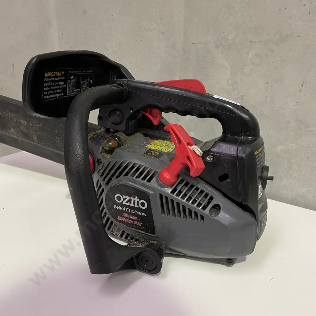 Ozito Petrol Chain Saw. 305mm Bar. Model PCS-305A Image 1++