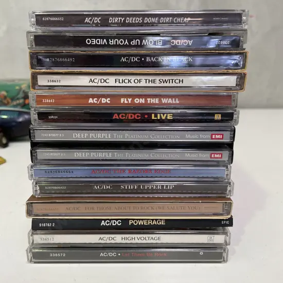 Large Collection of Assorted AC/DC CD's with Platinum Collection of Deep Purple