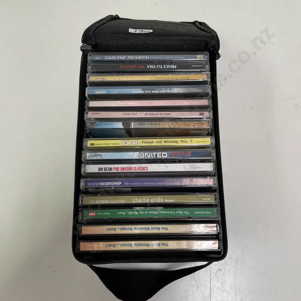 Assorted CD's in Case Image 1++