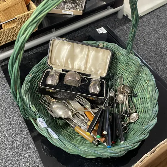 Green Basket with assorted Vintage Silverware