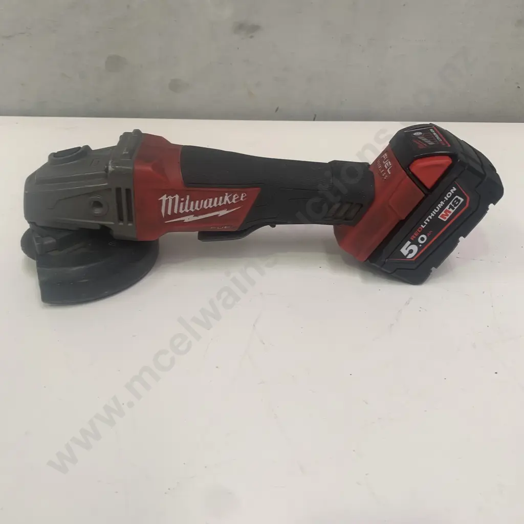 Milwaukee Fuel Brushless Angle Grinder M18 CAG125XPD with 5.0 Red Lithium Ion Battery - working Image 1++