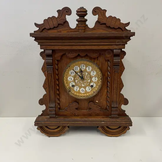 Vintage New York Ansonia Mantel Clock with key. Carved frame with intricate ornate gilded clock face. H45 W36 D14cm