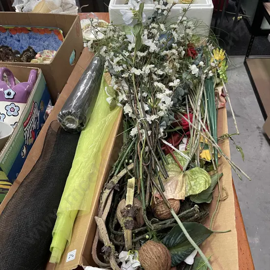 Large assortment of faux flowers with mesh and guaze wraps