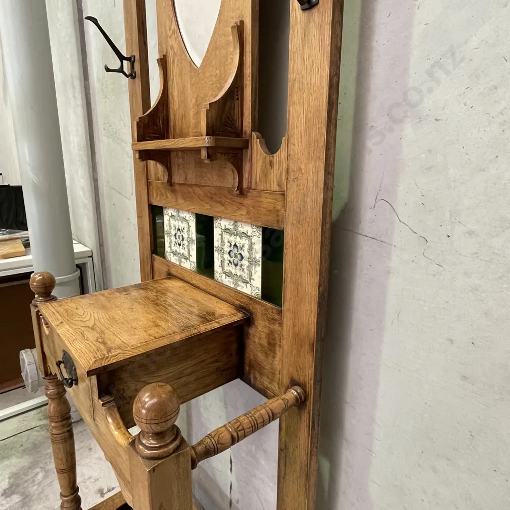Stunning Vintage Solid Oak Hall/Umbrella/Coat Stand. Excellent condition with mirror, carved detail and tiled back. Image 1++