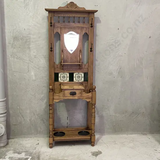Stunning Vintage Solid Oak Hall/Umbrella/Coat Stand. Excellent condition with mirror, carved detail and tiled back.