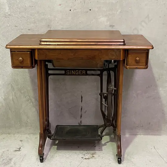 Antique Singer Sewing Table with Original Singer Sewing machine. On Castors, with accessories