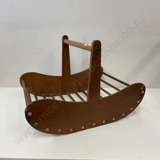 Mid Century Wooden basket with domed detailing. H28cm W41cm