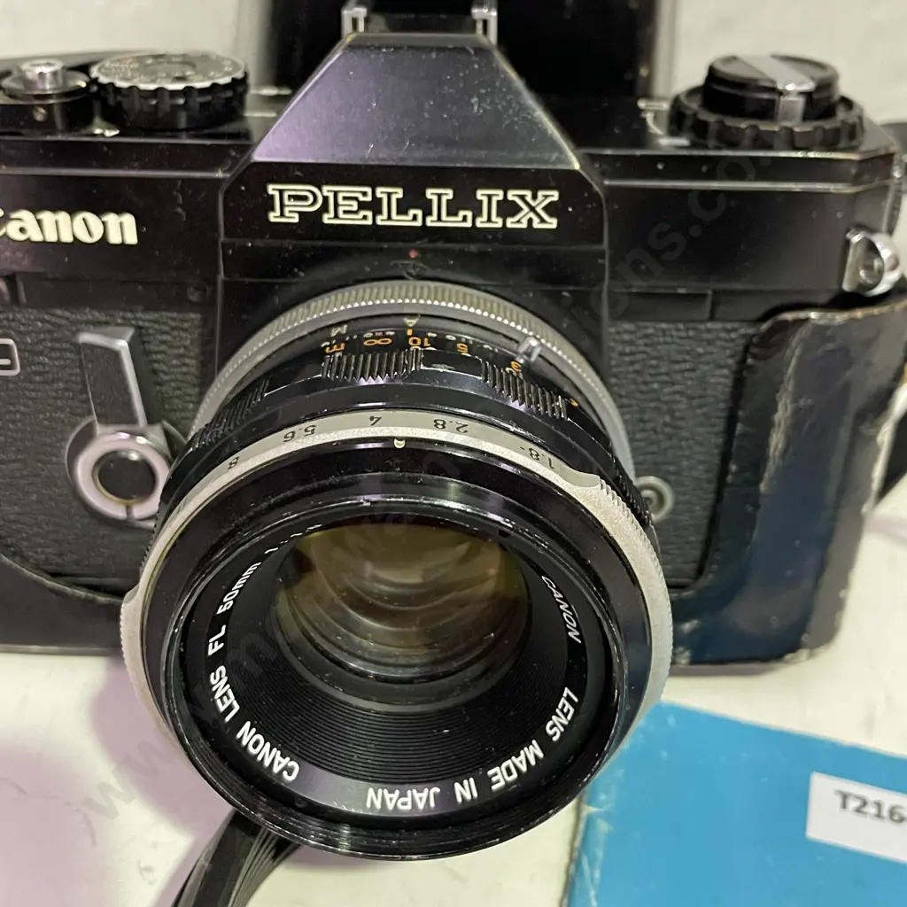 Vintage Canon Pellix Camera No. 107716 with FL 50mm Lens and leather case Image 1++