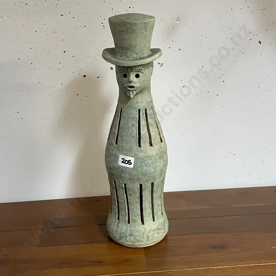 Painted terracotta Bottle figurine. marked as shown