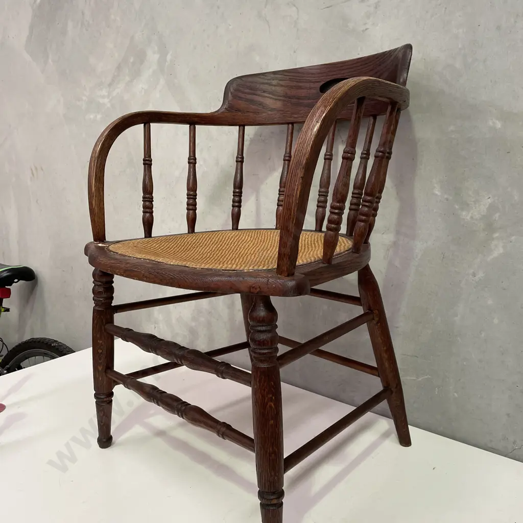 Antique Oak Spindle Back Captains Chair with woven rope seat Image 1++