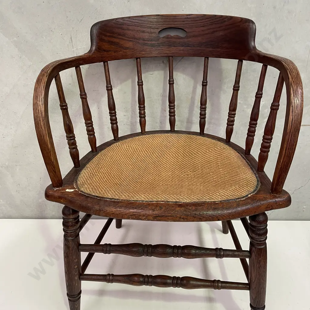 Antique Oak Spindle Back Captains Chair with woven rope seat Image 1++