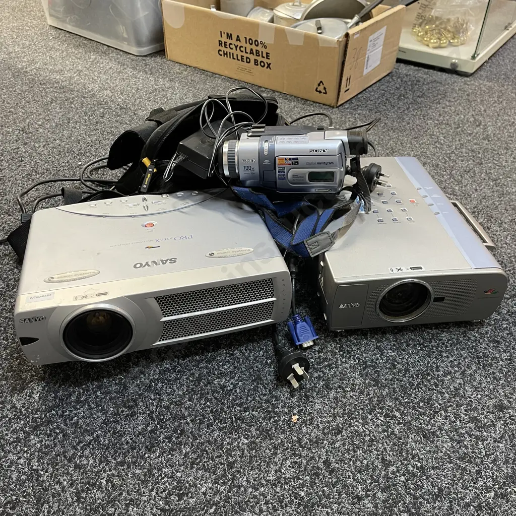 2 Sanyo Digital Projectors with a Sony Digital 8 Handycam with Bag and Cords Image 1++
