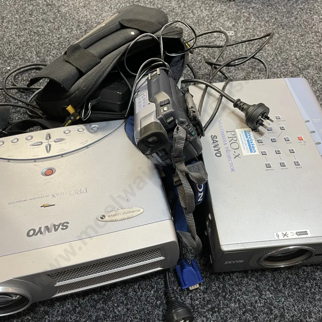 2 Sanyo Digital Projectors with a Sony Digital 8 Handycam with Bag and Cords Image 1++