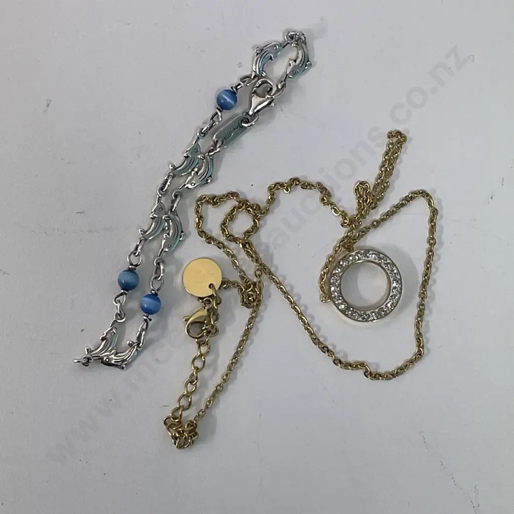 Unmarked gold chain pendant with daimante pendant and sterling silver bracelet Image 1++