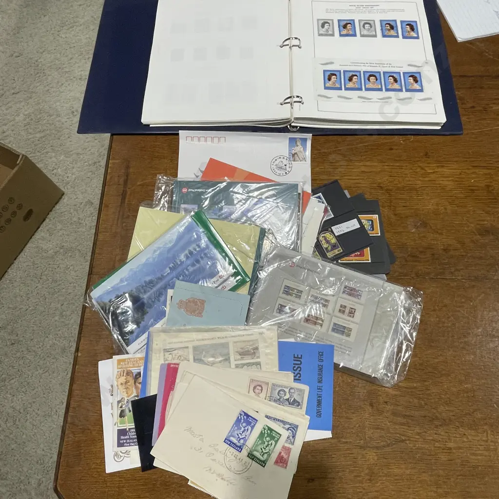 The Premier NZ Stamp Album with Large Selection of Assorted First Day Covers etc Image 1++