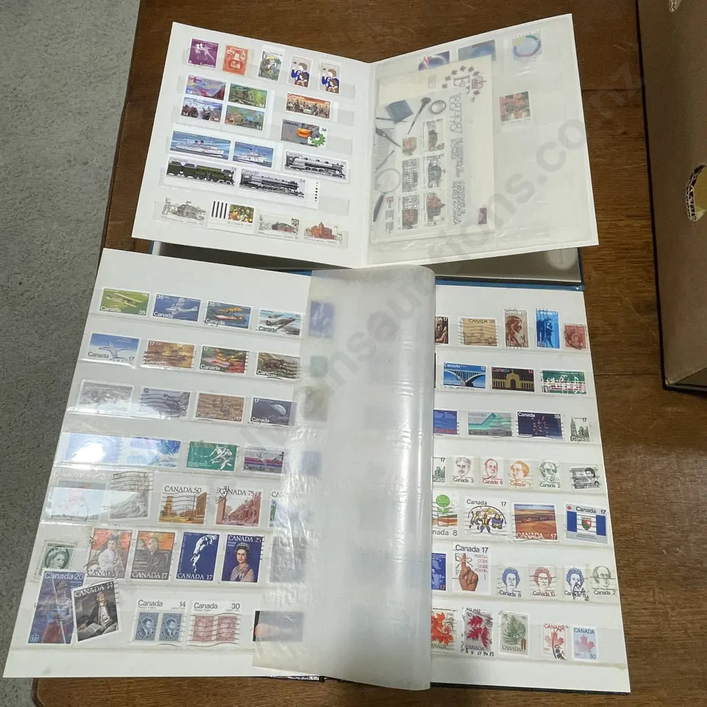 Two "Canada" Stamp Albums Image 1++