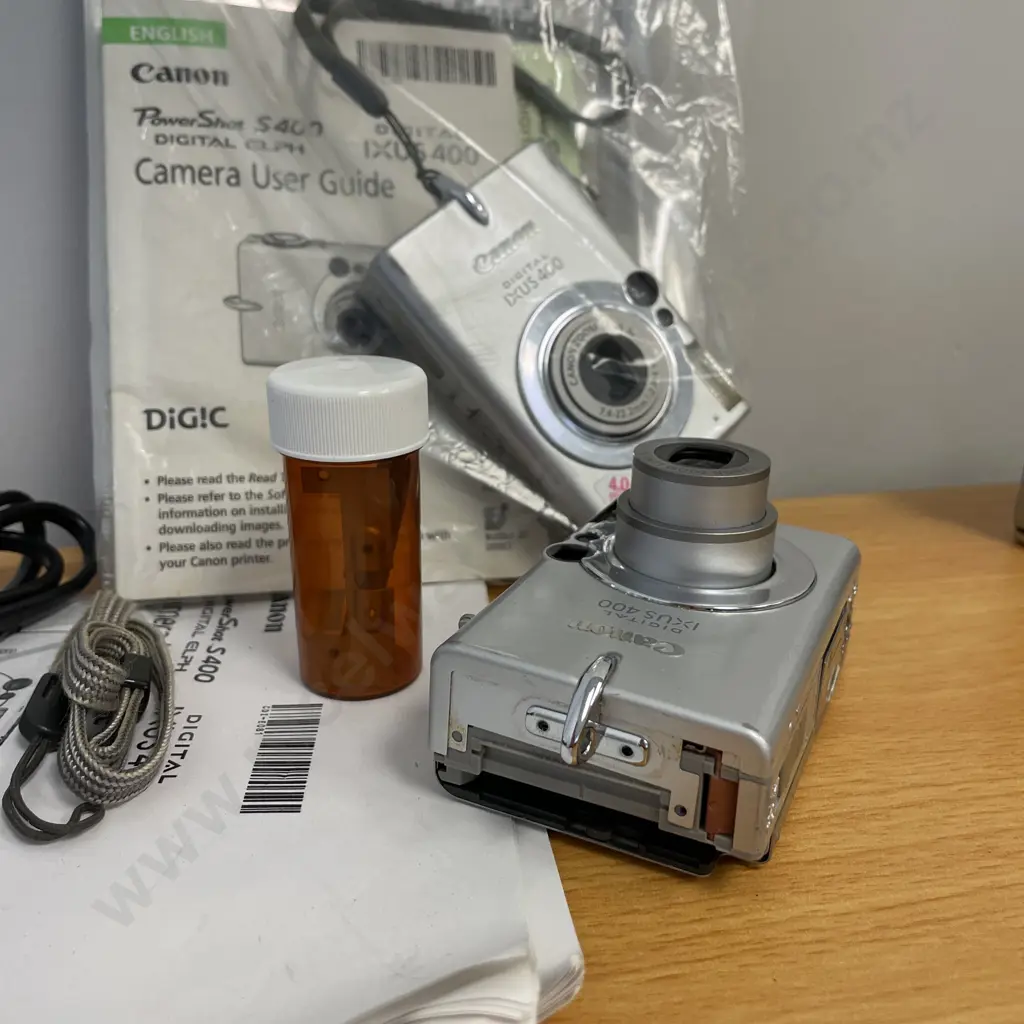 Two Canon Digital IXUS 400 Cameras with accessories, manuals etc Image 1++