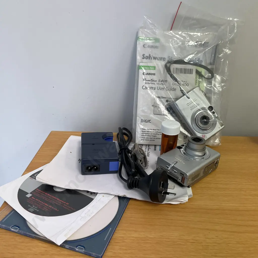 Two Canon Digital IXUS 400 Cameras with accessories, manuals etc Image 1++