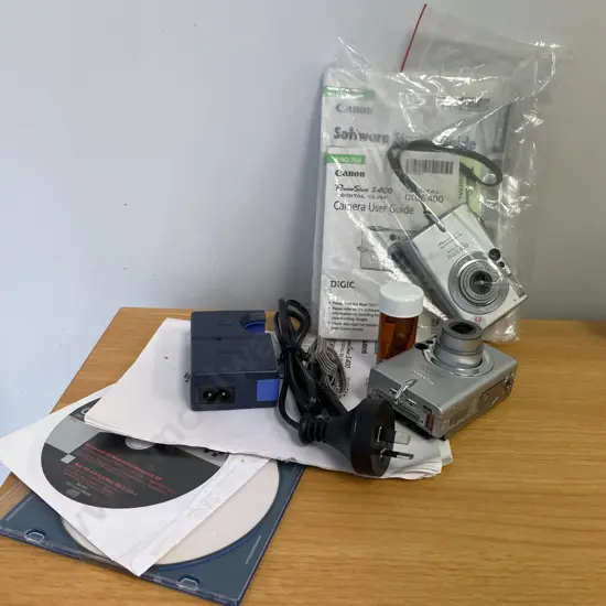 Two Canon Digital IXUS 400 Cameras with accessories, manuals etc