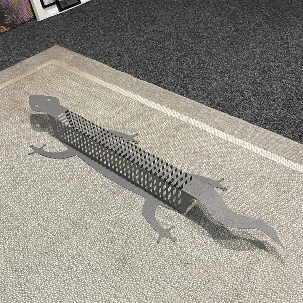 Galvanised Metal Wall Hung Lizard CD Rack. H1.2 metres Image 1++