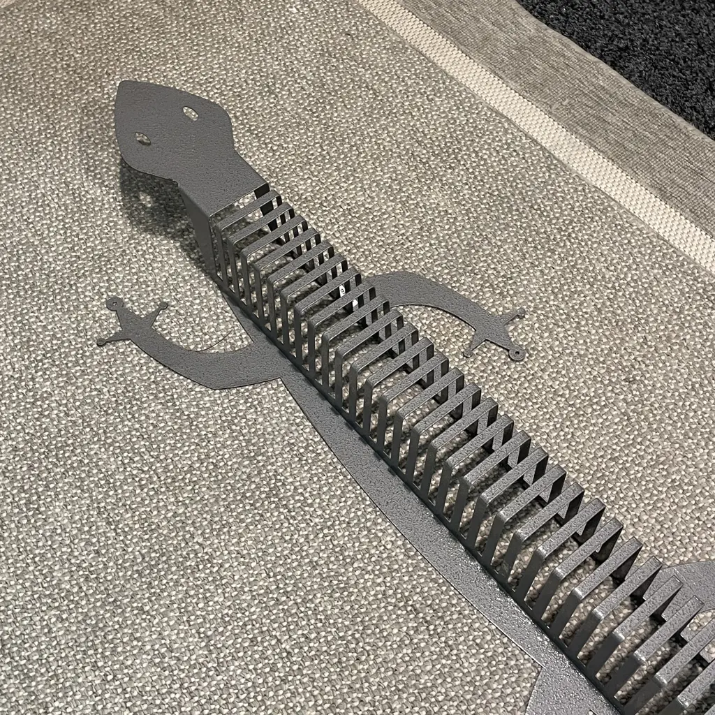 Galvanised Metal Wall Hung Lizard CD Rack. H1.2 metres Image 1++