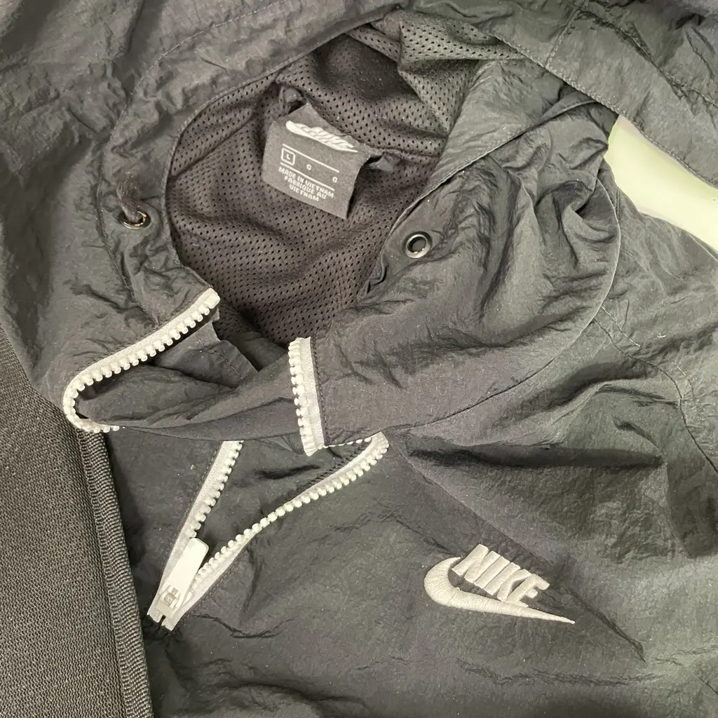 Black Nike Jacket with Black Backpack Image 1++