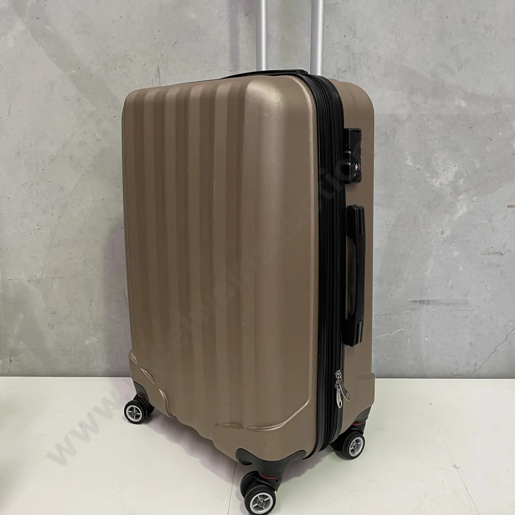 Stelxis Bronze Coloured Suitcase on wheels Image 1++