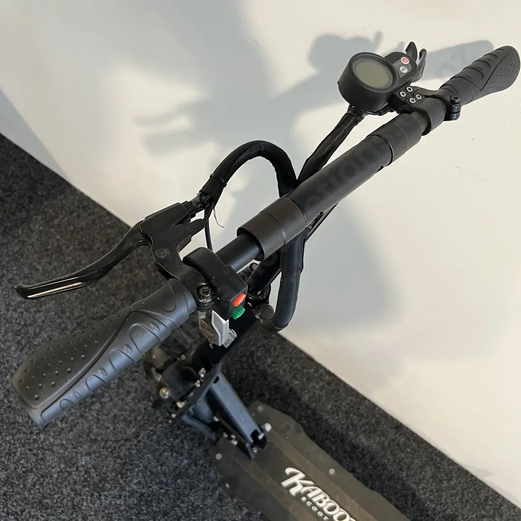 Electric Kaboota Scooter with Madd Gear Helmet Image 1++