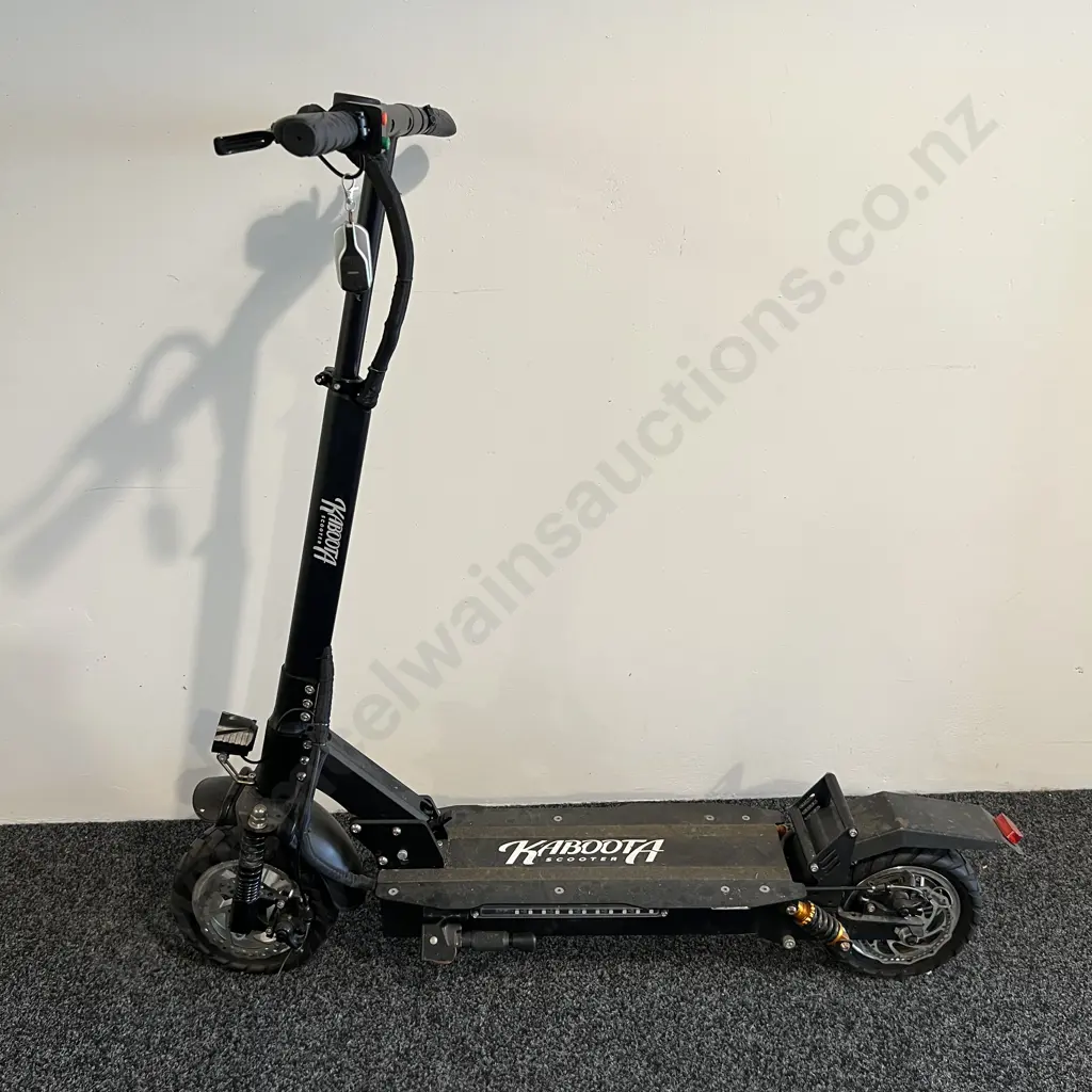 Electric Kaboota Scooter with Madd Gear Helmet Image 1++