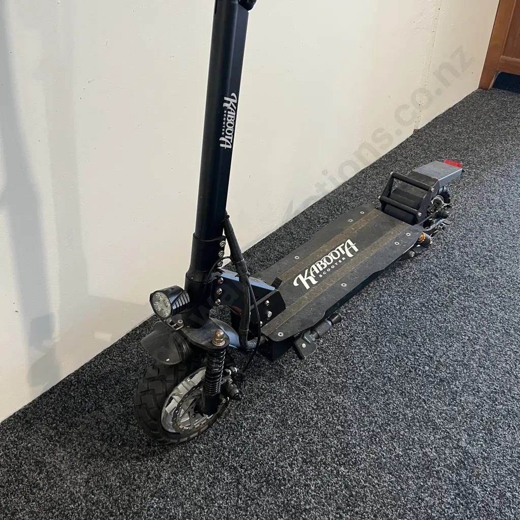 Electric Kaboota Scooter with Madd Gear Helmet Image 1++