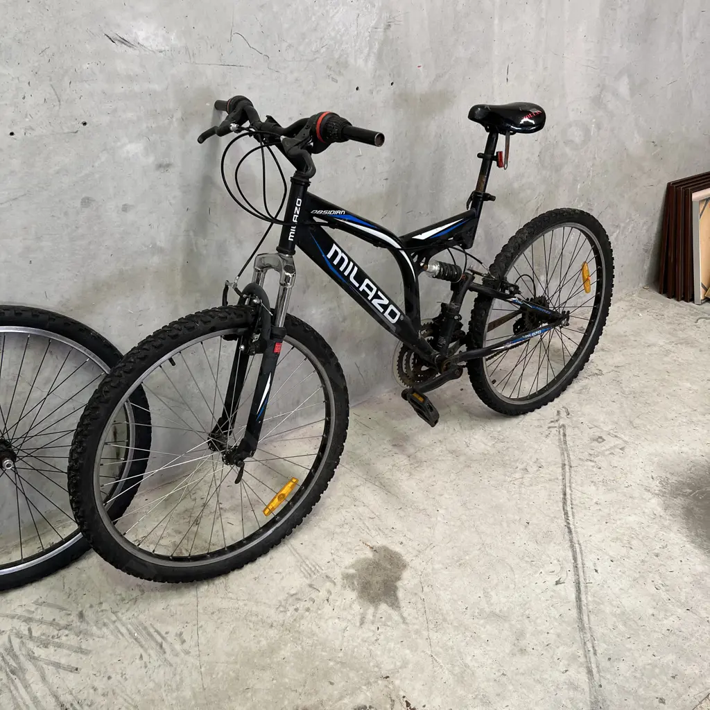 Milazo Obsidian Bike. Black/White and Blue. With spare wheel Image 1++