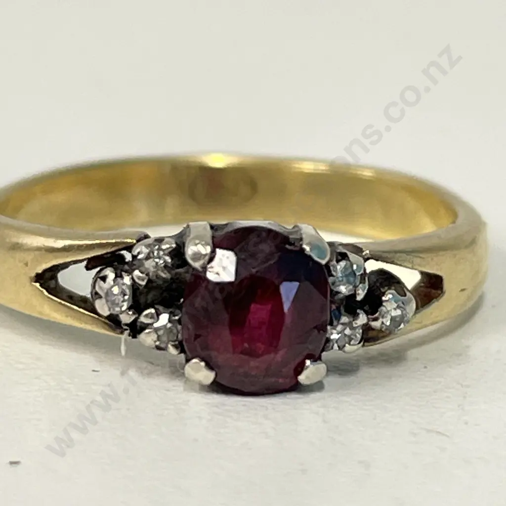 18CT Gold Ring with Ruby and diamonds. Stamped 750 Image 1++