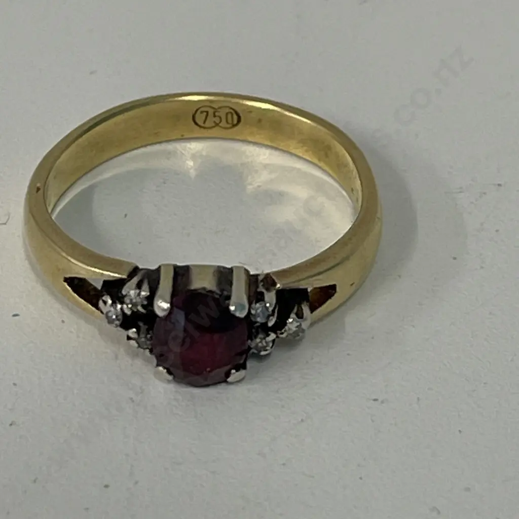 18CT Gold Ring with Ruby and diamonds. Stamped 750 Image 1++