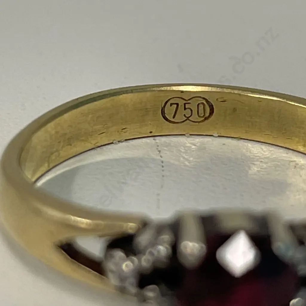18CT Gold Ring with Ruby and diamonds. Stamped 750 Image 1++